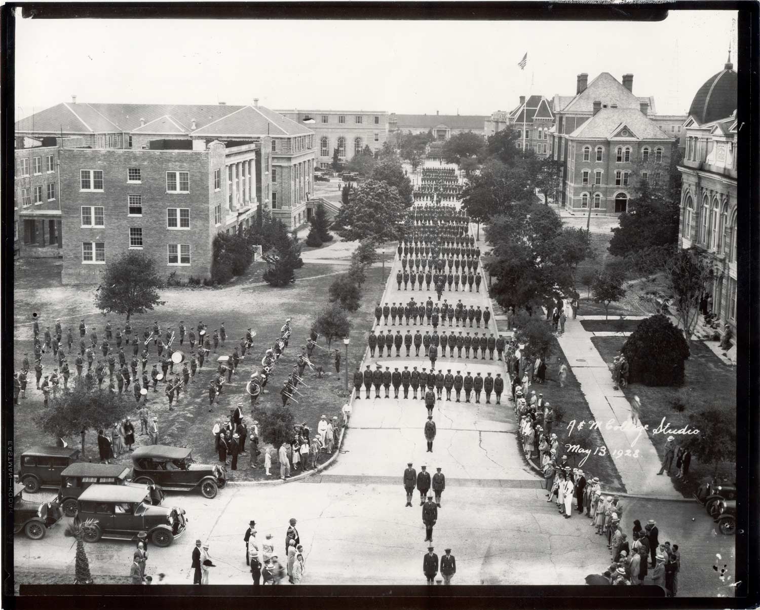 A 1928 photo of the corps of cadets marching in