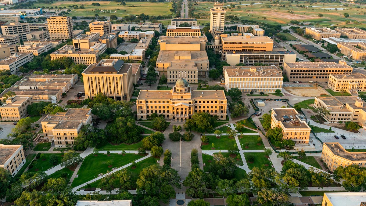 Aerial view of the Texas A&M University administration building at the heart of campus