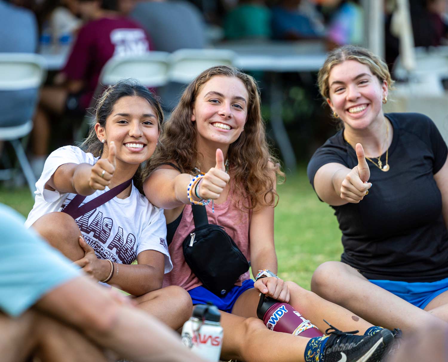 Excited students posing for a photo - gig 'em