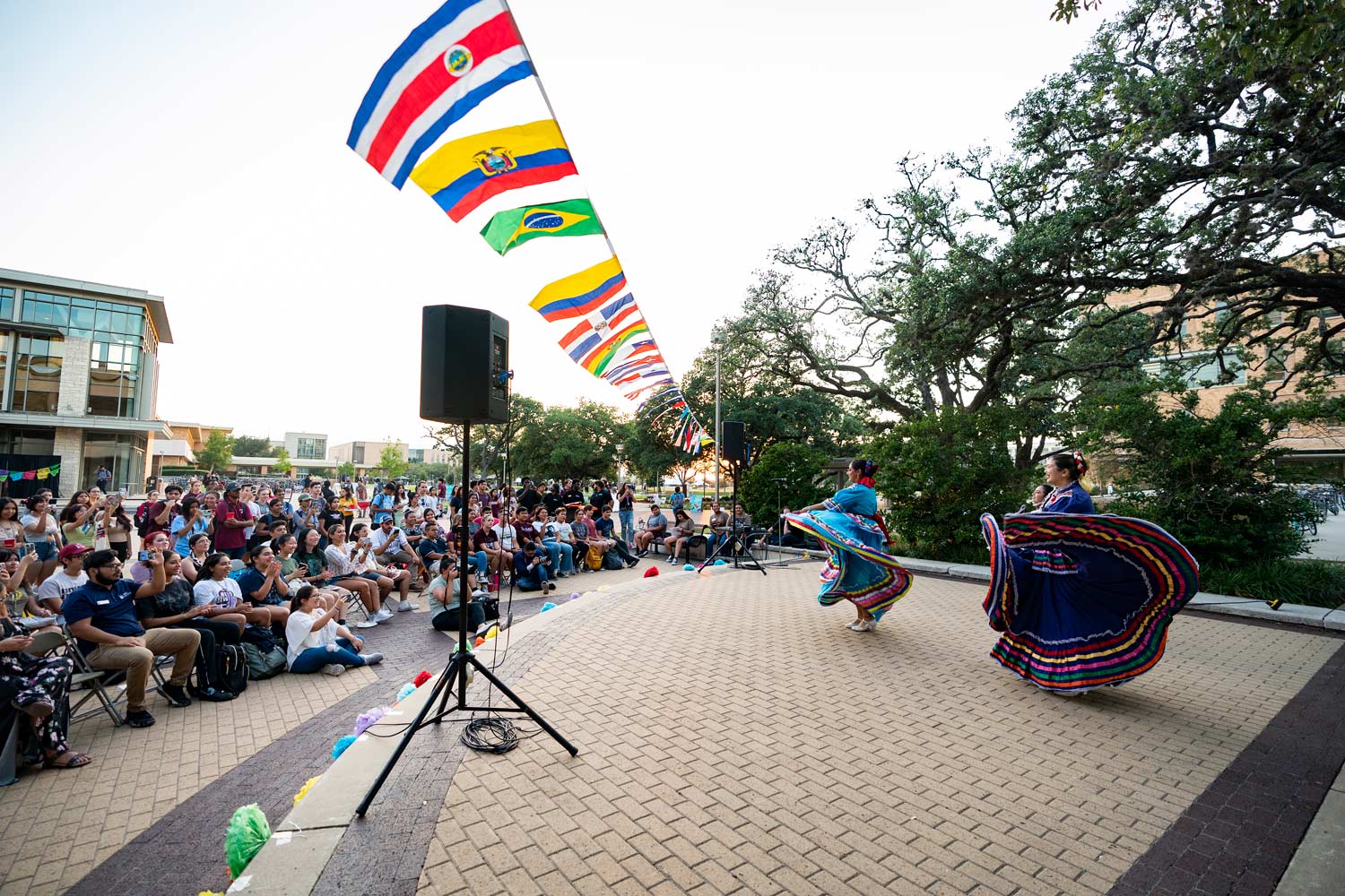 Traditional dance performed for students on the Rudder Plaza stage
