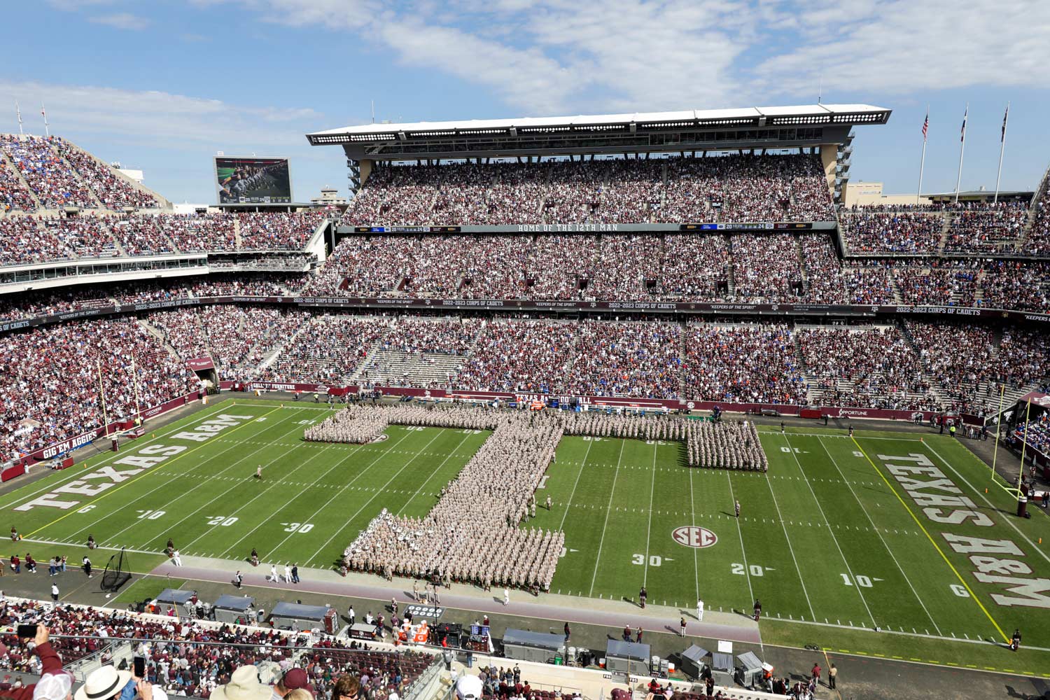 The Fightin' Texas Aggie Band forming a Block T on Kyle Field during halftime at a football game