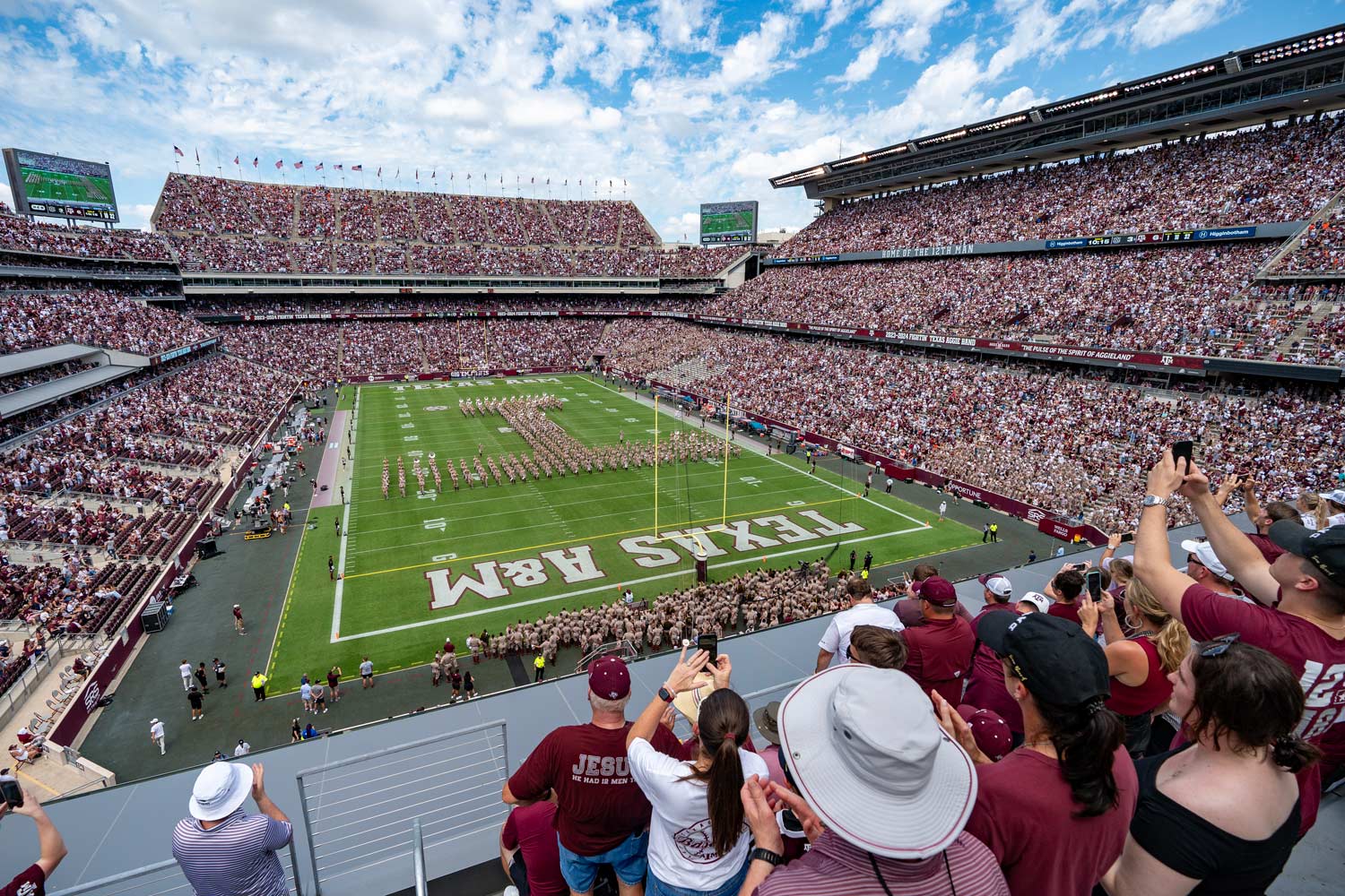 2nd deck view of a completely maroon Kyle Field during a halftime performance
