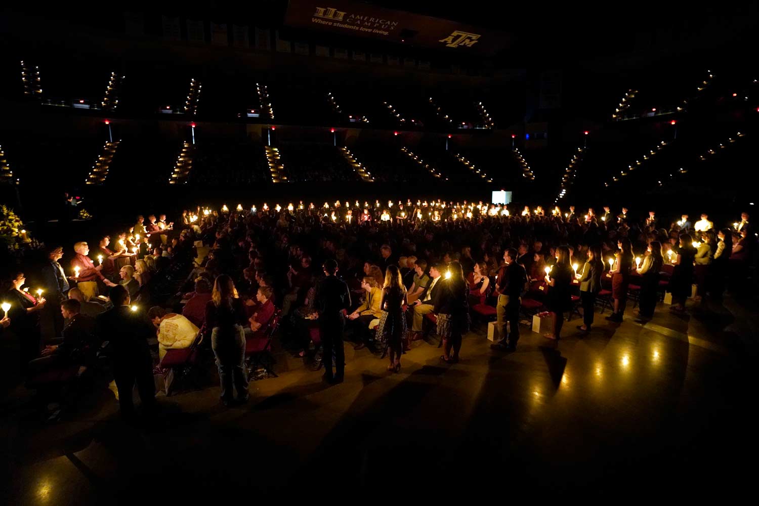 A view of the muster candles from the stands of Reed Arena