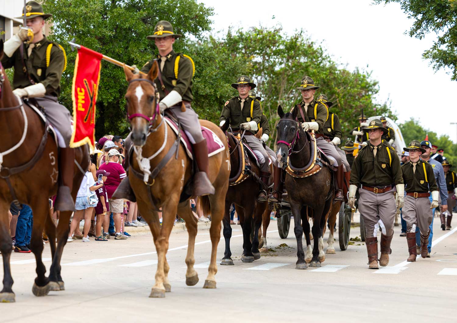 Parsons Mounted Cavalry marching in with the Corps of Cadets before an Aggie football game