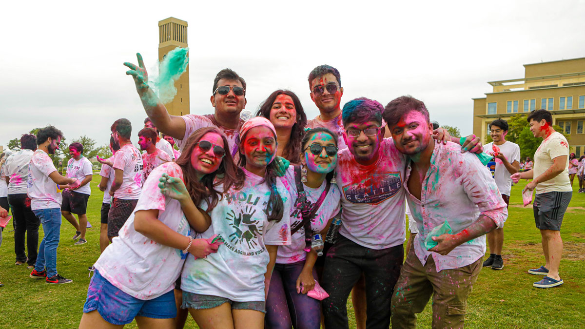 Students enjoying holi celebration on Texas A&M Campus